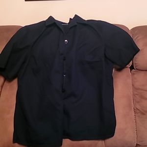 Woman's black button-up sharp.